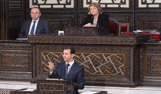 الأسد خلال خطابه أمام مجلس الشعب السوري الأسد خلال خطابه أمام مجلس الشعب السوري