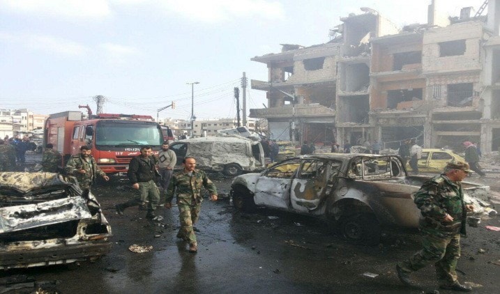مراسلة الميادين: استشهاد أكثر من 30 شخصاً بهجمات انتحارية متزامنة على فرعي الأمن العسكري والأمن الدولي في مدينة حمص مراسلة الميادين: استشهاد أكثر من 30 شخصاً بهجمات انتحارية متزامنة على فرعي الأمن العسكري والأمن الدولي في مدينة حمص