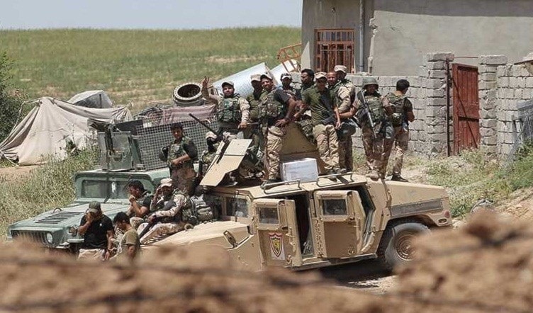 قوات الحشد الشعبي في القرى المحيطة بالقيروان قوات الحشد الشعبي في القرى المحيطة بالقيروان