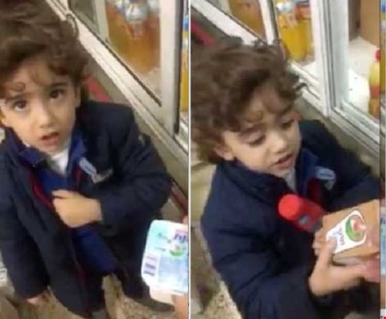 الطفل الفلسطيني كان مصرّاً على عدم شراء البضائع الإسرائيلية الطفل الفلسطيني كان مصرّاً على عدم شراء البضائع الإسرائيلية