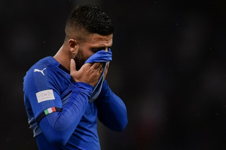 لاعب إيطاليا لورنزو إنسينيي خلال المباراة (أ ف ب) لاعب إيطاليا لورنزو إنسينيي خلال المباراة (أ ف ب)