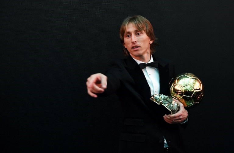 مودريتش أولا لاعب منذ 44 عاماً يخسر نهائي المونديال ويُحرز الجائزة (أ ف ب) مودريتش أولا لاعب منذ 44 عاماً يخسر نهائي المونديال ويُحرز الجائزة (أ ف ب)