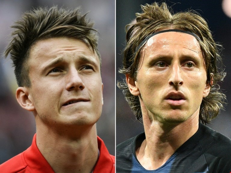 بين مودريتش وغولوفين .. من يحكم خط الوسط؟ (أ ف ب) بين مودريتش وغولوفين .. من يحكم خط الوسط؟ (أ ف ب)