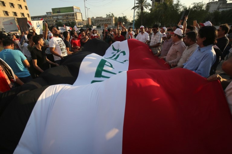 من المظاهرات في العراق (أ ف ب) من المظاهرات في العراق (أ ف ب)