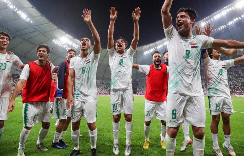 لاعبو العراق يحتفلون بالفوز (أ ف ب) لاعبو العراق يحتفلون بالفوز (أ ف ب)