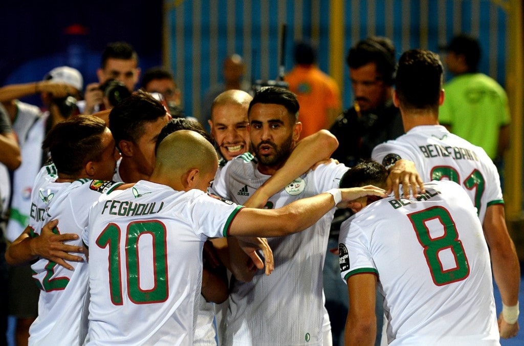 4 إنتصارات في 4 مباريات للجزائر حتى الآن (أ ف ب) 4 إنتصارات في 4 مباريات للجزائر حتى الآن (أ ف ب)