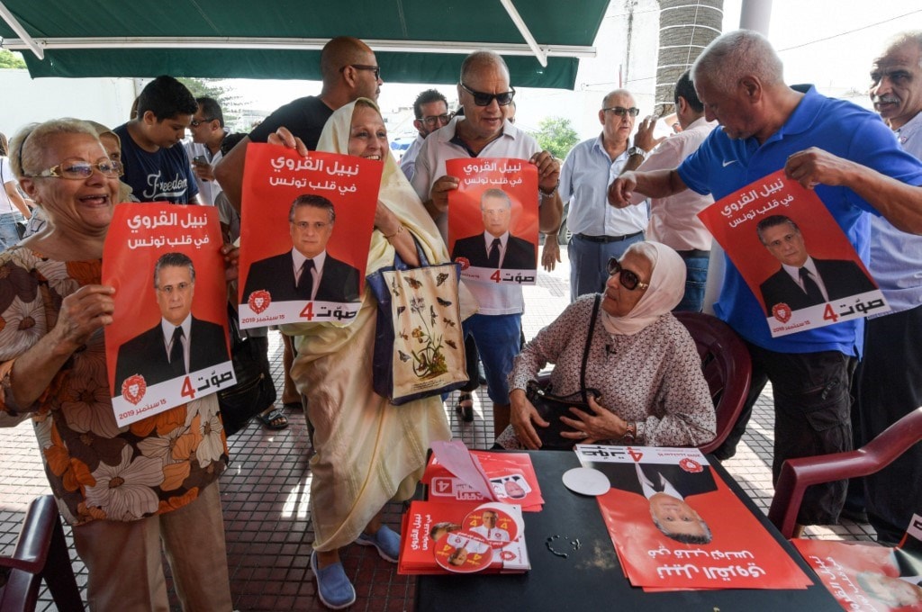 من الحملات الانتخابية للمرشح القروي في مدينة بنزرت التونسية اليوم / أ.ف.ب من الحملات الانتخابية للمرشح القروي في مدينة بنزرت التونسية اليوم / أ.ف.ب