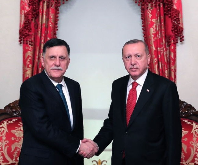 إردوغان والسراج في لقاء سابق إردوغان والسراج في لقاء سابق