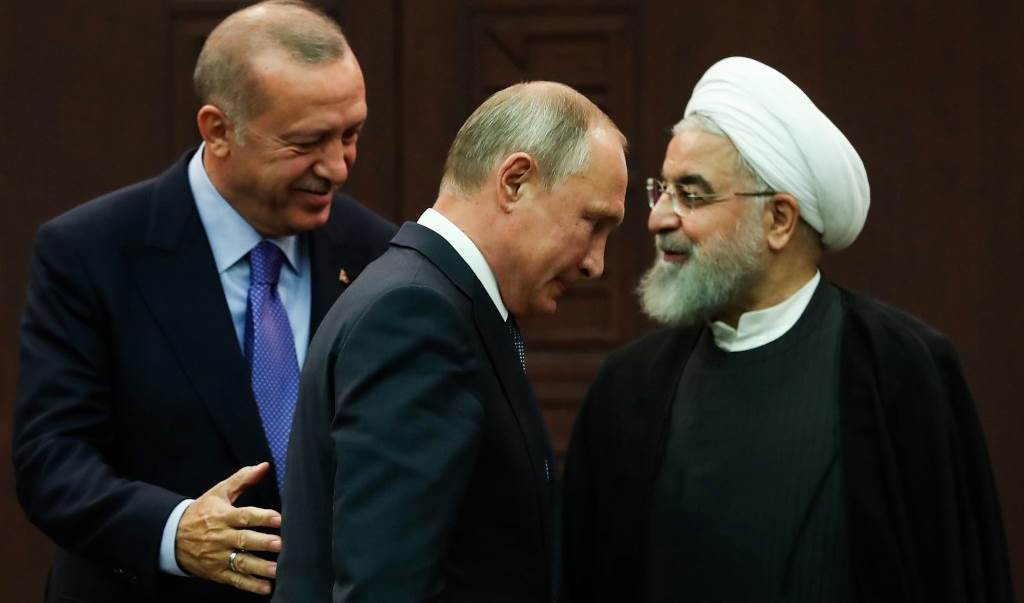 أردوغان وبوتين وروحاني بعد مؤتمر صحفي عقب اجتماع ثلاثي بشأن سوريا في أنقرة في 16 أيلول/ سبتمبر 2019 (أ ف ب - أرشيف)