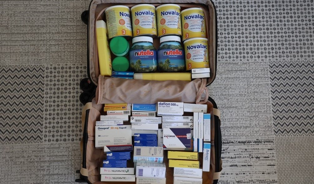 Lebanese abroad are visiting Lebanon with luggage packed with food and medicine.