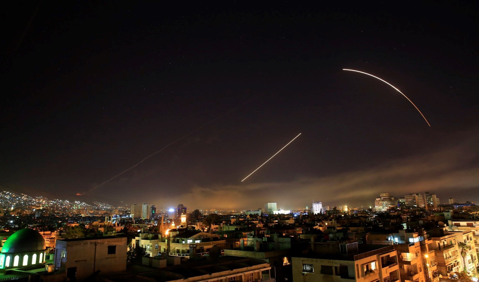 Syrian air defense missiles intercepting Israeli missiles 