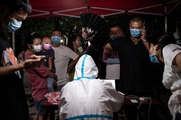Chinese citizens waiting to get tested for COVID-19 in Wuhan
