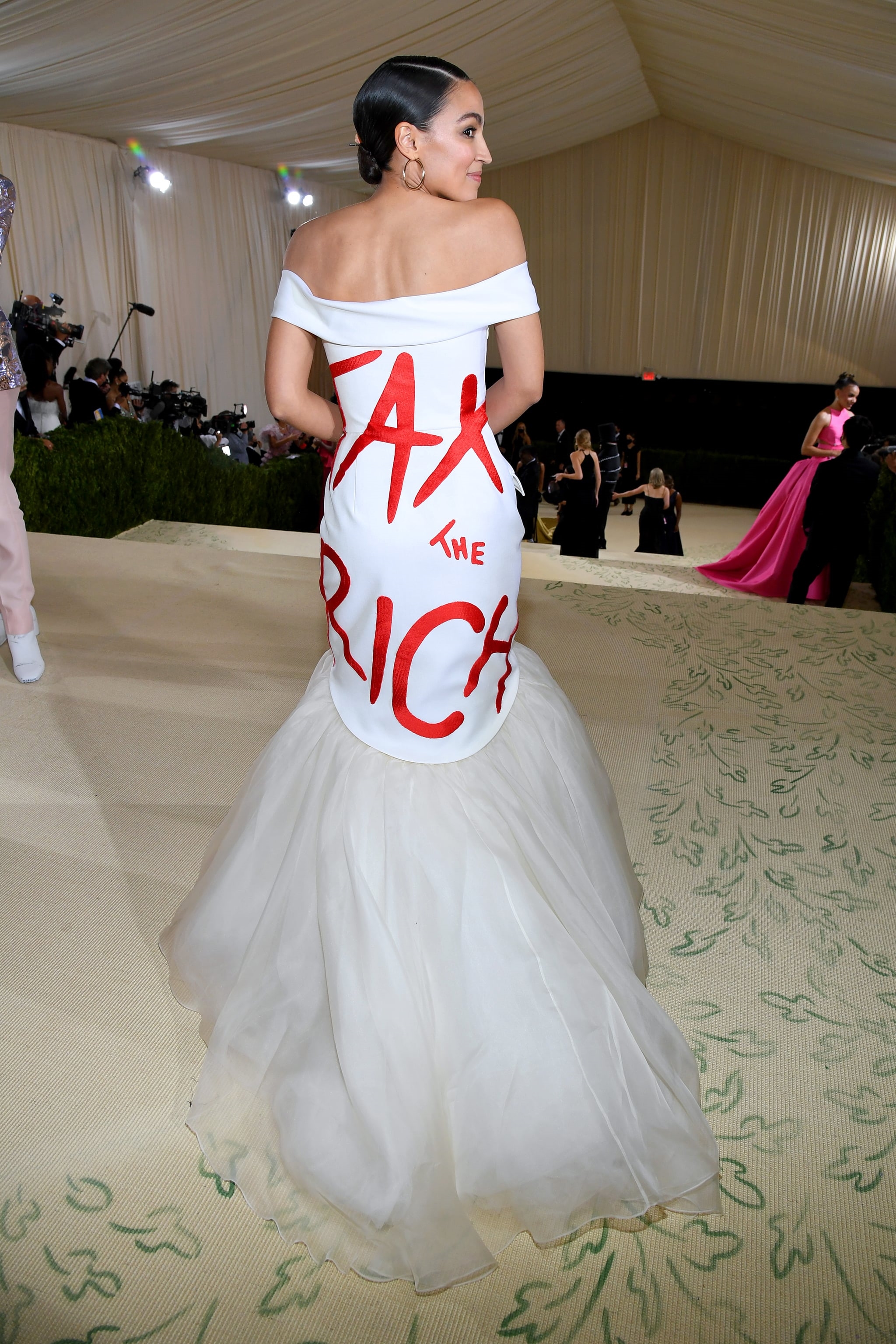 Ocasio-Cortez attends The 2021 Met Gala Celebrating In America: A Lexicon Of Fashion at Metropolitan Museum of Art on Sept 13, 2021 in New York City | Vogue
